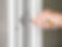man-finishing-mounting-window-frame.jpg